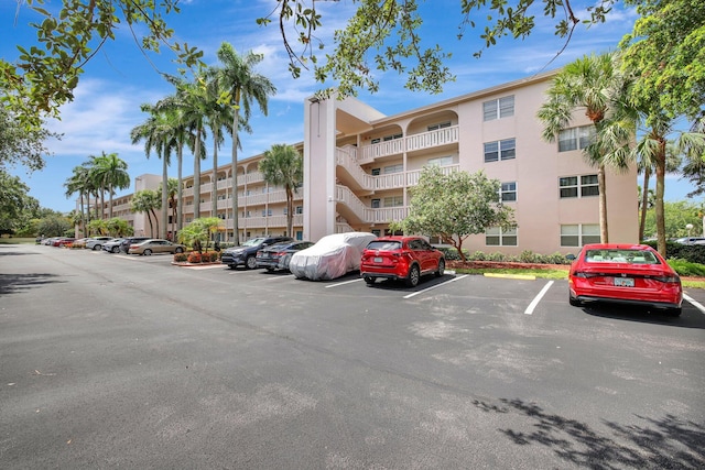 2004 Granada Dr Unit L2, Coconut Creek, FL 33066 - view of apartment building / complex with uncovered parking