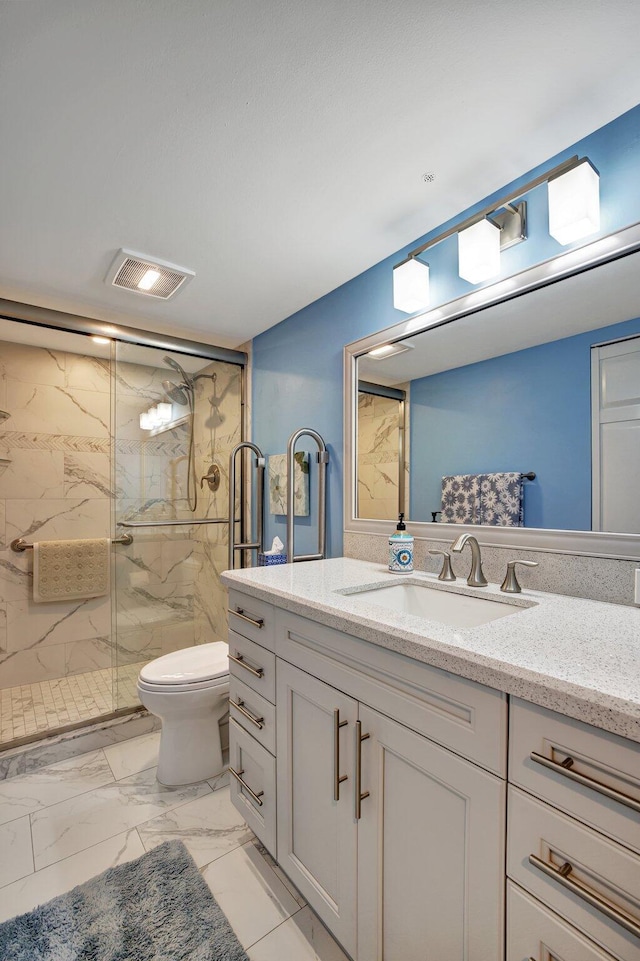 2004 Granada Dr Unit L2, Coconut Creek, FL 33066 - full bathroom with marble finish flooring, toilet, a marble finish shower, and vanity