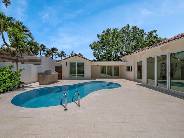 view of pool with a patio area