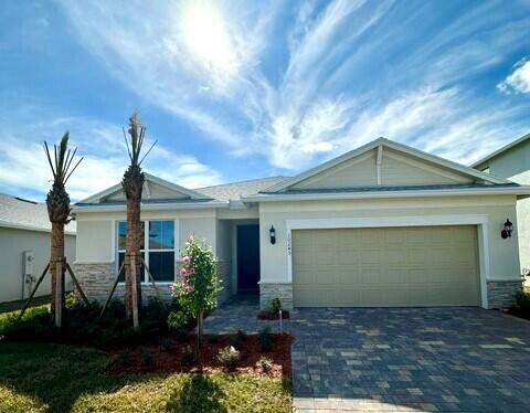 single story home with a garage