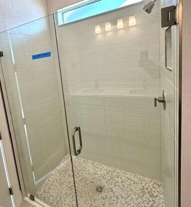 bathroom featuring walk in shower