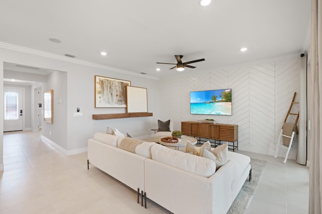 living room featuring ceiling fan and crown molding