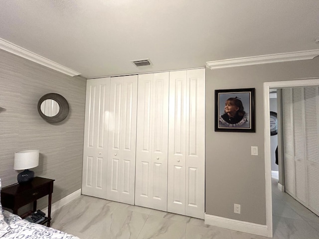 bedroom featuring crown molding