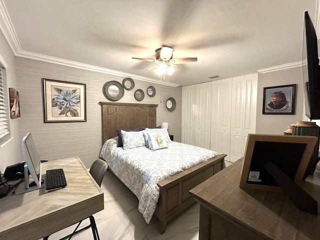 tiled bedroom featuring a closet, ceiling fan, and ornamental molding