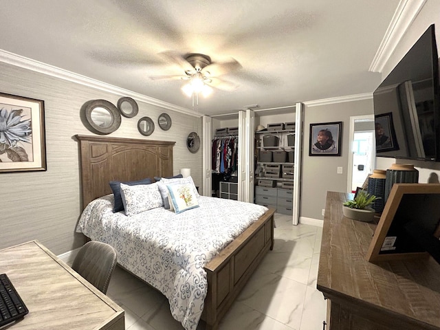 bedroom featuring a walk in closet, ceiling fan, crown molding, and light tile patterned flooring