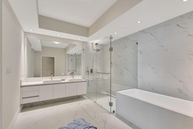 bathroom featuring plus walk in shower and vanity