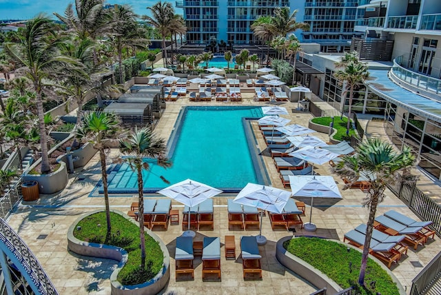 view of swimming pool with a patio