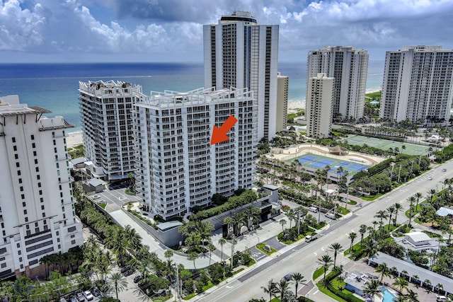 birds eye view of property featuring a water view