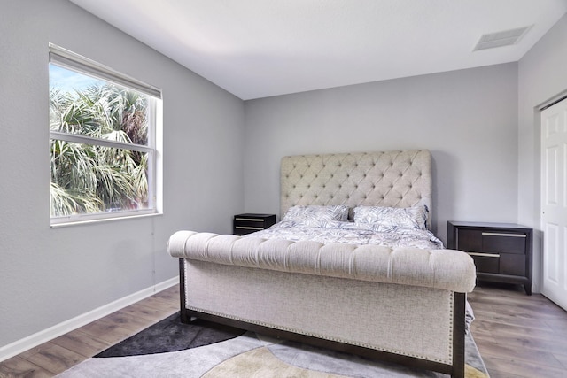 bedroom featuring hardwood / wood-style flooring