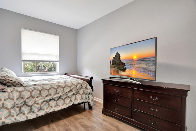 bedroom featuring light wood-type flooring