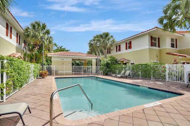 view of swimming pool featuring a patio