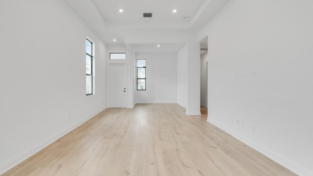 empty room with light wood-type flooring