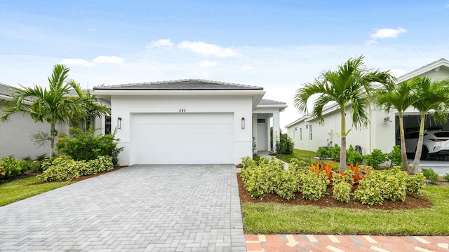 view of front of home with a garage