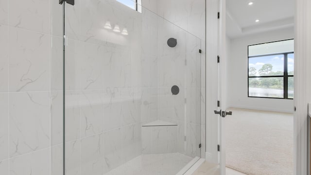 bathroom featuring a tile shower