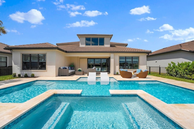 view of swimming pool featuring outdoor lounge area and a patio