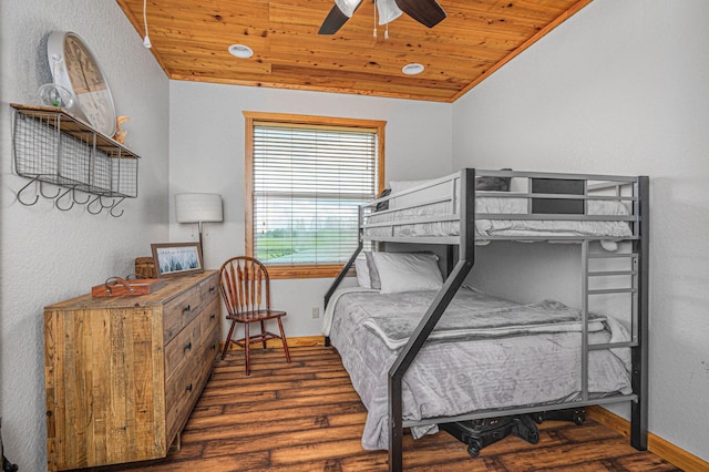 bedroom with lofted ceiling, ceiling fan, wood ceiling, and dark wood-type flooring