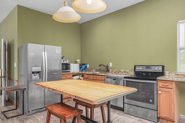 kitchen featuring sink and appliances with stainless steel finishes