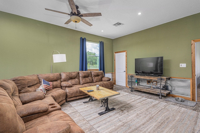 living room with ceiling fan