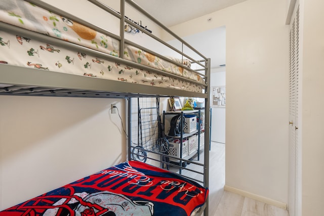 bedroom featuring hardwood / wood-style flooring