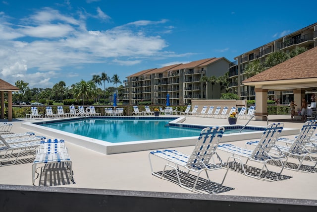 view of swimming pool featuring a patio