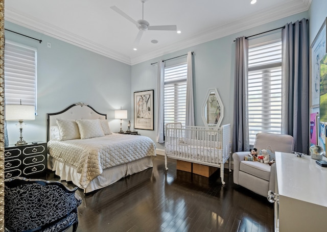 bedroom with multiple windows, ceiling fan, and crown molding