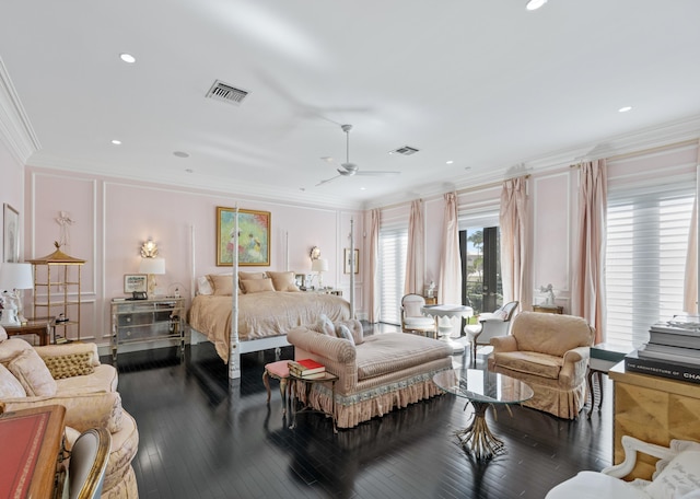 bedroom featuring ceiling fan, crown molding, and dark wood-type flooring