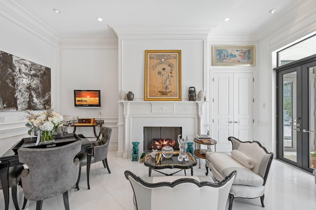 sitting room featuring light tile patterned floors, french doors, and crown molding