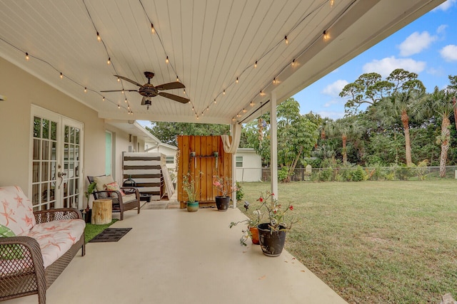 view of patio featuring french doors and ceiling fan