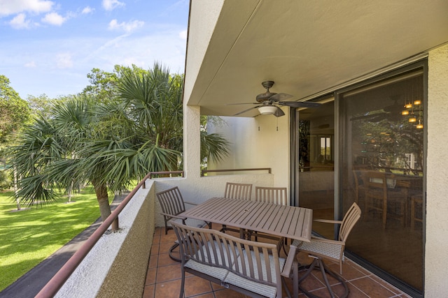 view of patio featuring a balcony and ceiling fan