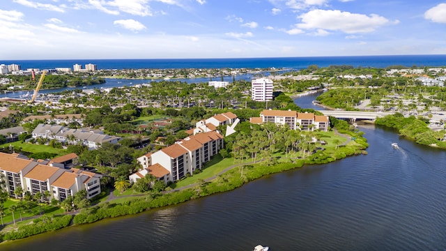 bird's eye view with a water view