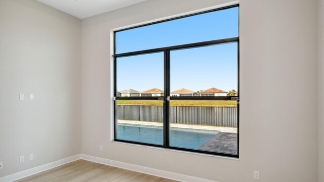 unfurnished bedroom with light carpet and a closet