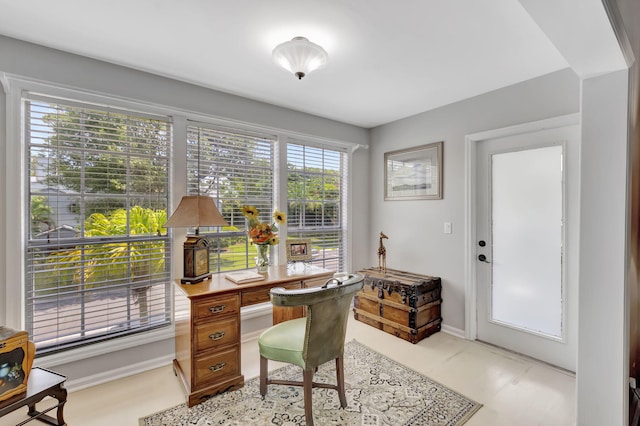 office area with light hardwood / wood-style flooring