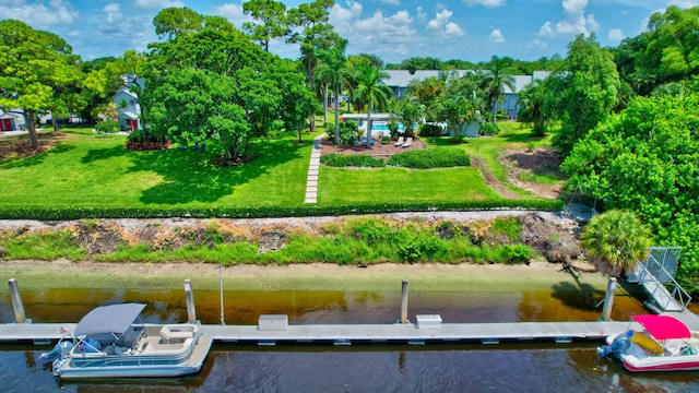 exterior space with a yard and a water view