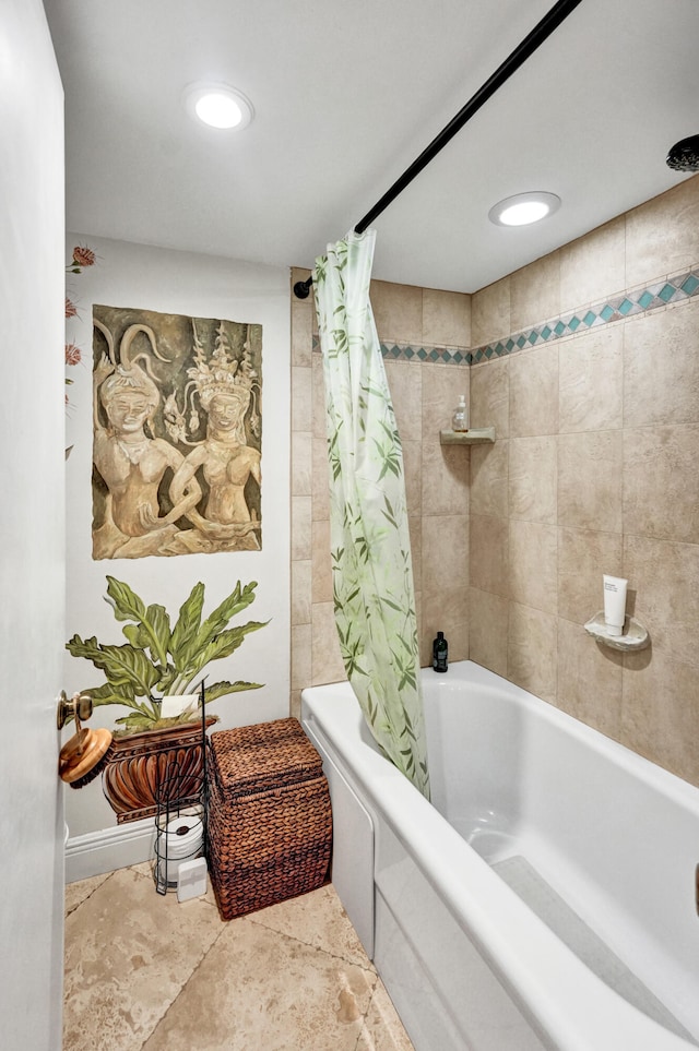 bathroom featuring shower / tub combo with curtain