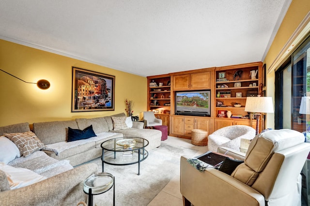 living room with a textured ceiling, built in shelves, ornamental molding, and light tile patterned flooring