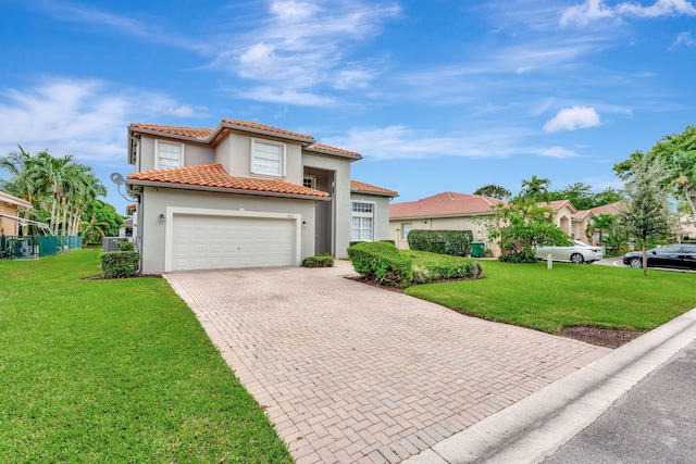 mediterranean / spanish-style home with a front lawn and a garage