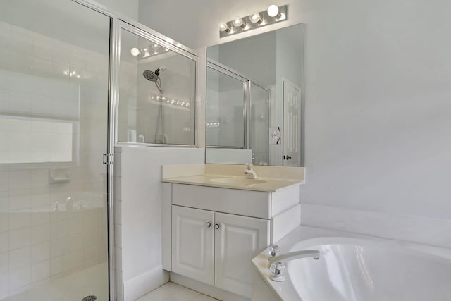 bathroom with vanity, plus walk in shower, and tile patterned floors