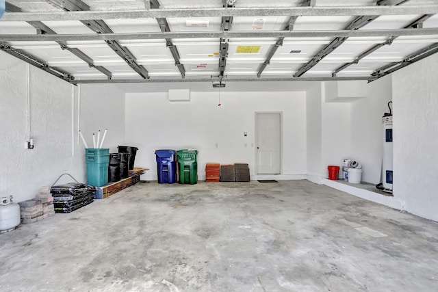 garage featuring water heater