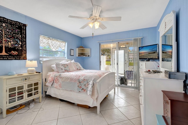 tiled bedroom featuring access to exterior and ceiling fan