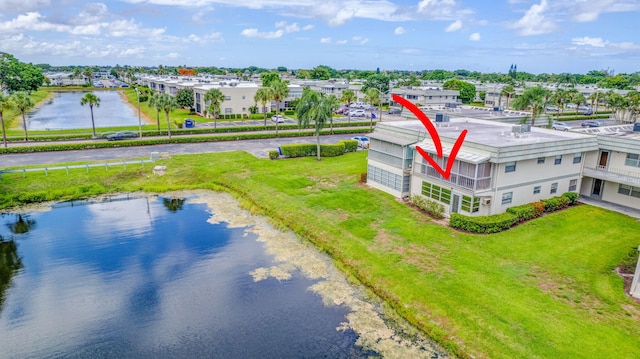 drone / aerial view with a water view