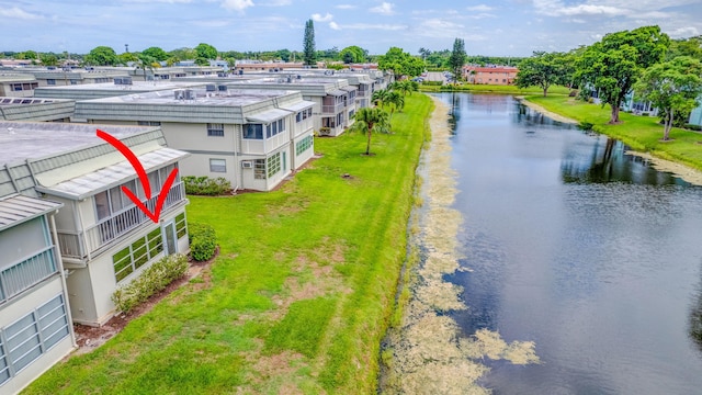 drone / aerial view featuring a water view