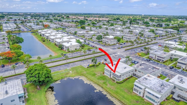 drone / aerial view featuring a water view