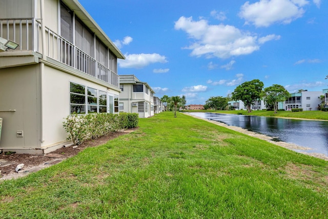 view of yard with a water view