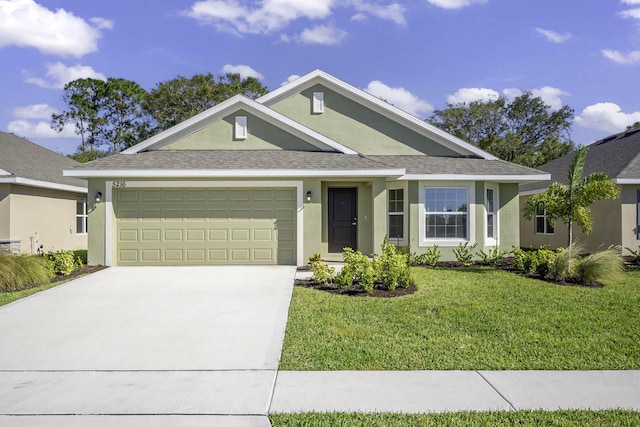 single story home with a front lawn and a garage