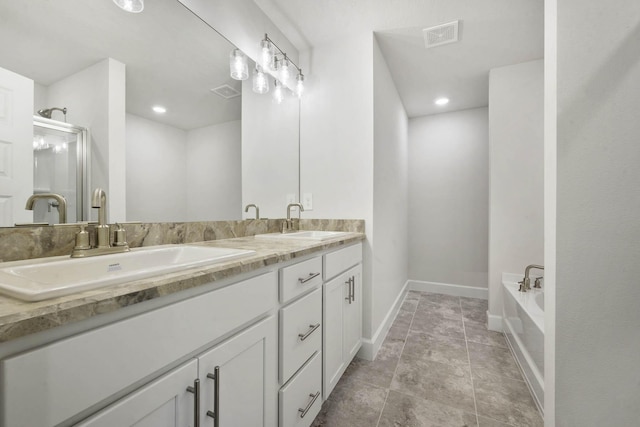 bathroom with vanity and a bathtub