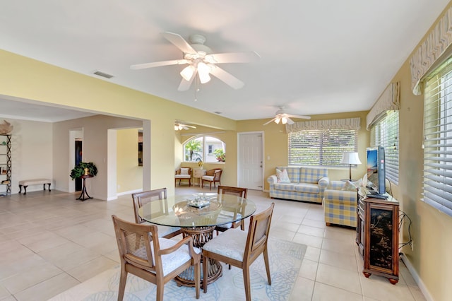 tiled dining area with a wealth of natural light