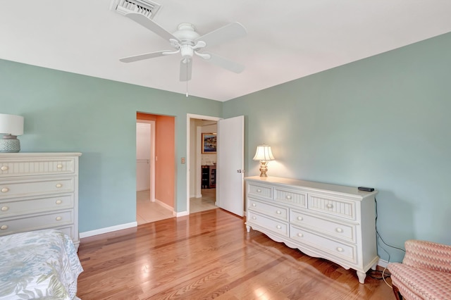 bedroom featuring ceiling fan and light hardwood / wood-style flooring