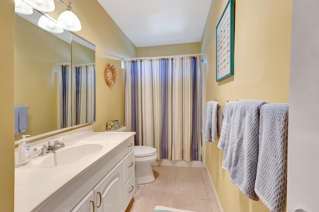 bathroom featuring a shower with curtain, vanity, toilet, and tile patterned flooring