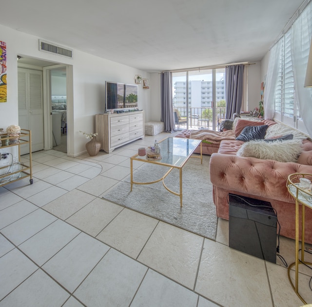 living room featuring light tile patterned flooring