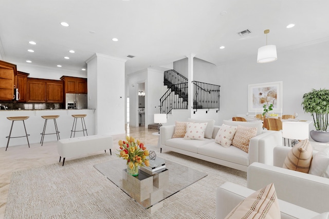 living room with crown molding